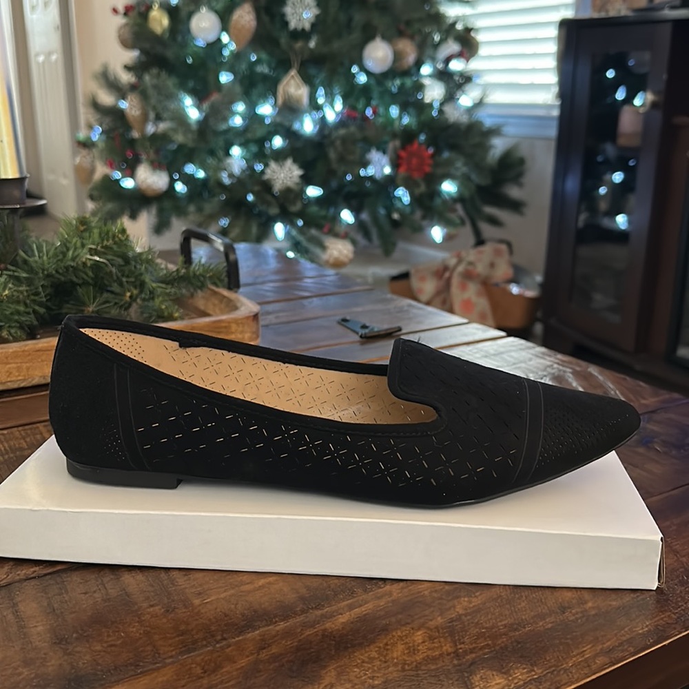 Black Flats 
Brand new! Never worn! Original packaging